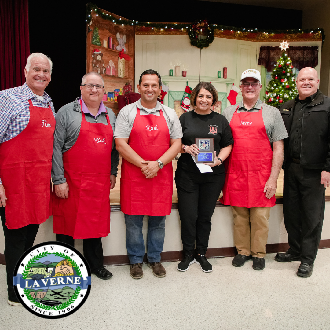 Jennifer Brown receiving Mike Shaw award from La Verne City Council
